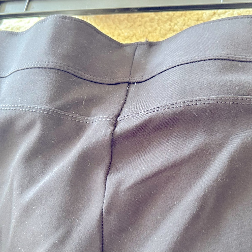 Black stretch slim dress pants with beautiful sparkle detail on ankle.